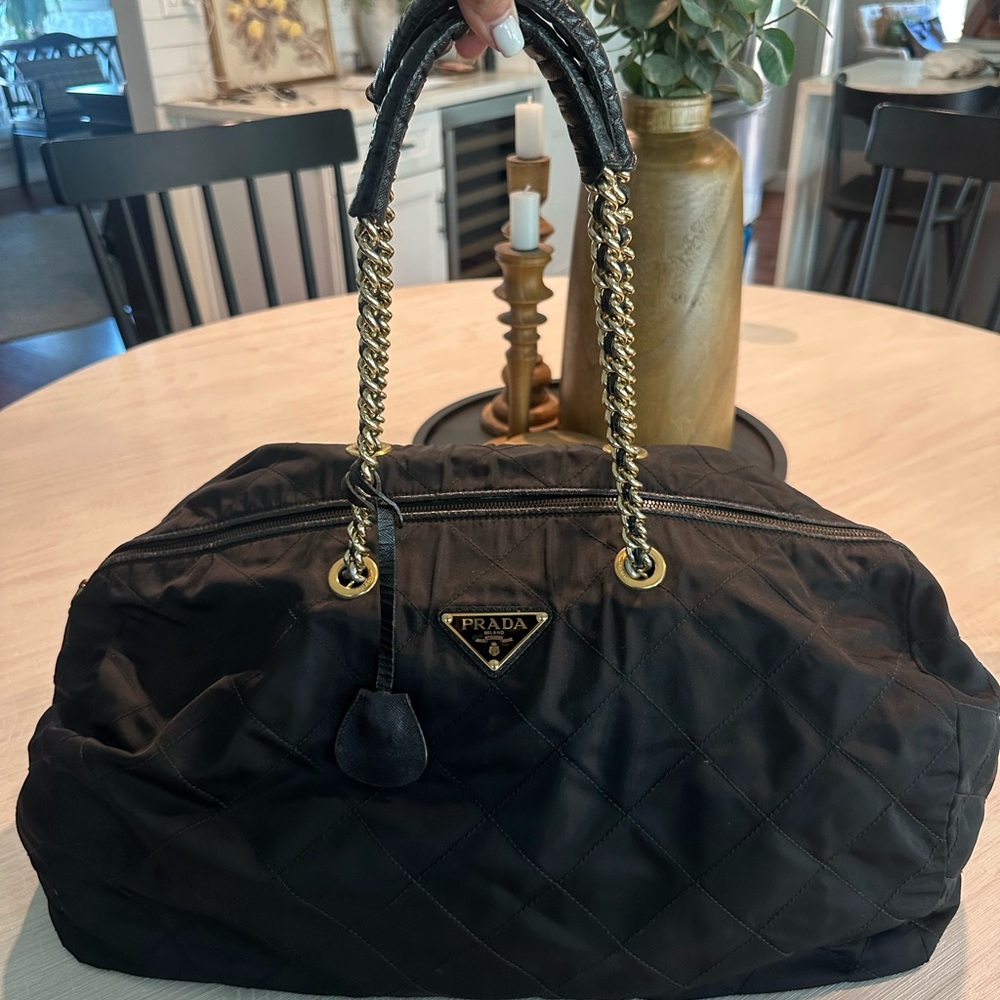 Prada Black Quilted Travel Bag with Gold Accents